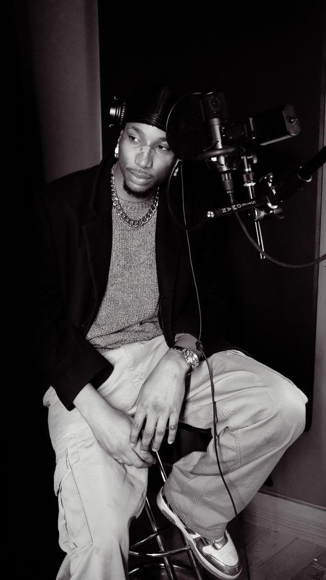 Rock Benjamins seated in the studio